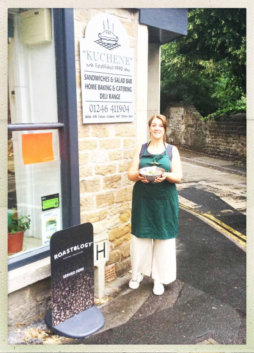 Kerry, the owner of Kuchene Deli Dronfield outside the shop